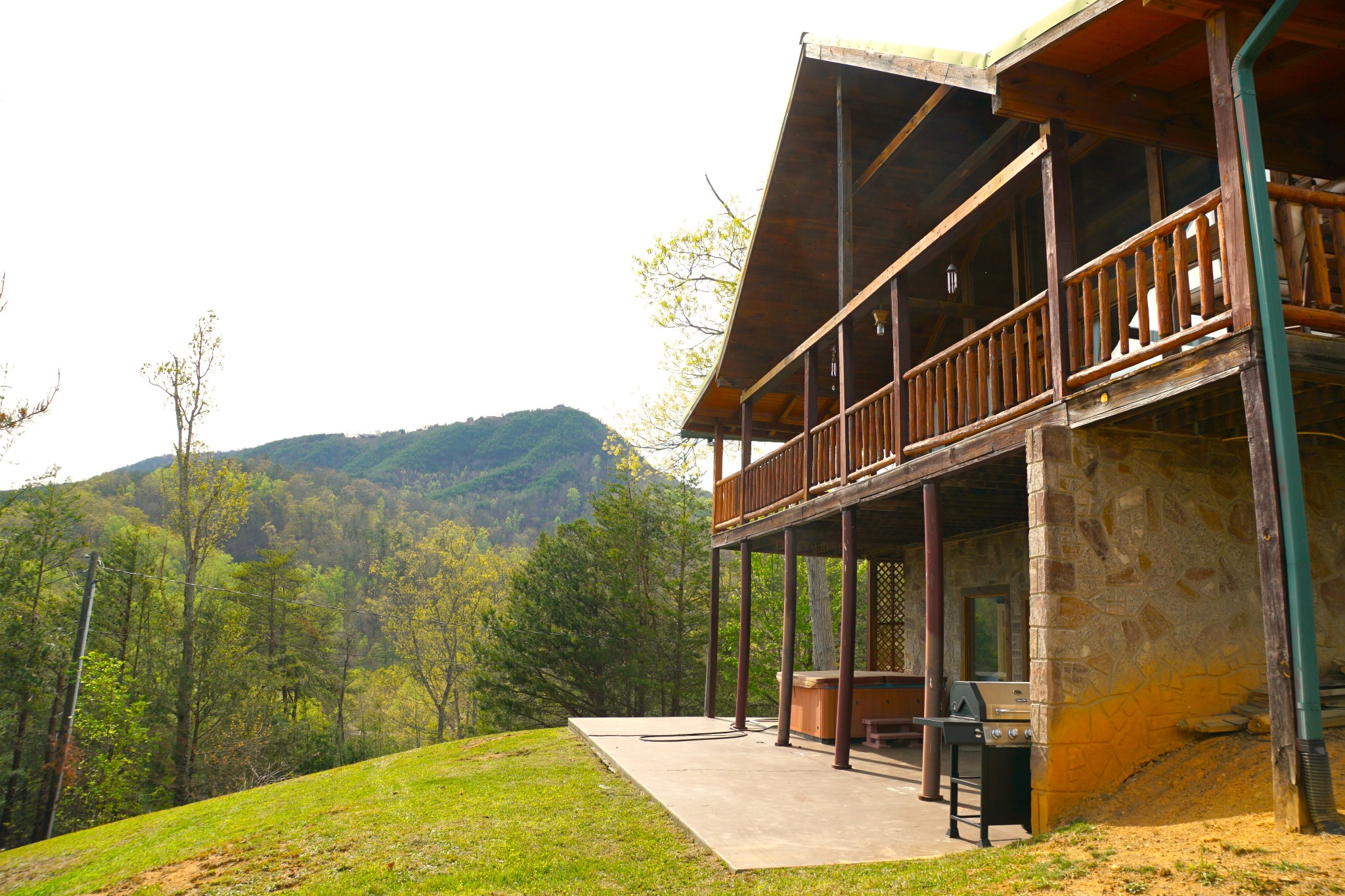 1724 Bluff Ridge Road Sevierville, TN 37876 - Photo 2 of 29 a view of a house with a backyard