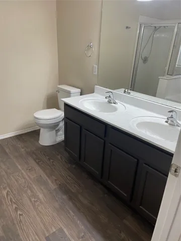 a bathroom with a sink and a toilet