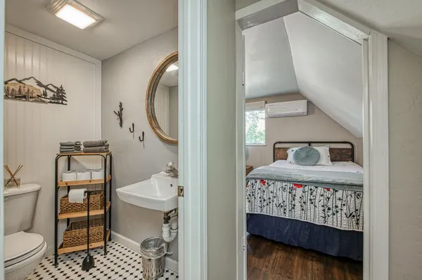 a backyard of a house with table and chairs