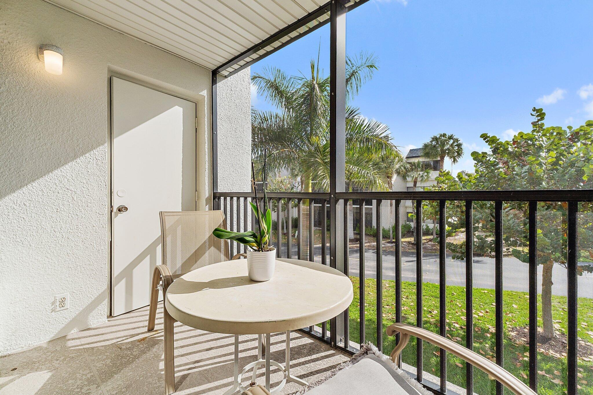 1605 Highway 1, Unit V2204 Jupiter, FL 33477 - Photo 29 of 36 a view of a balcony with furniture and outside view