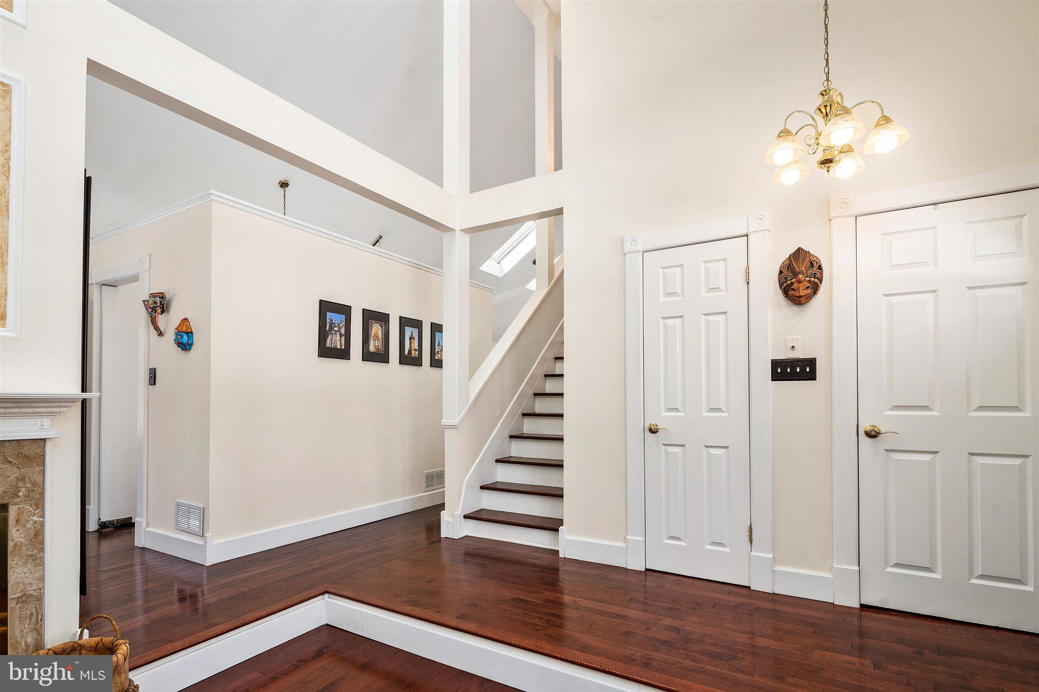 6 Ginger Road Chesterfield, NJ 08515 - Photo 12 of 48 a view of a hallway with wooden floor and staircase