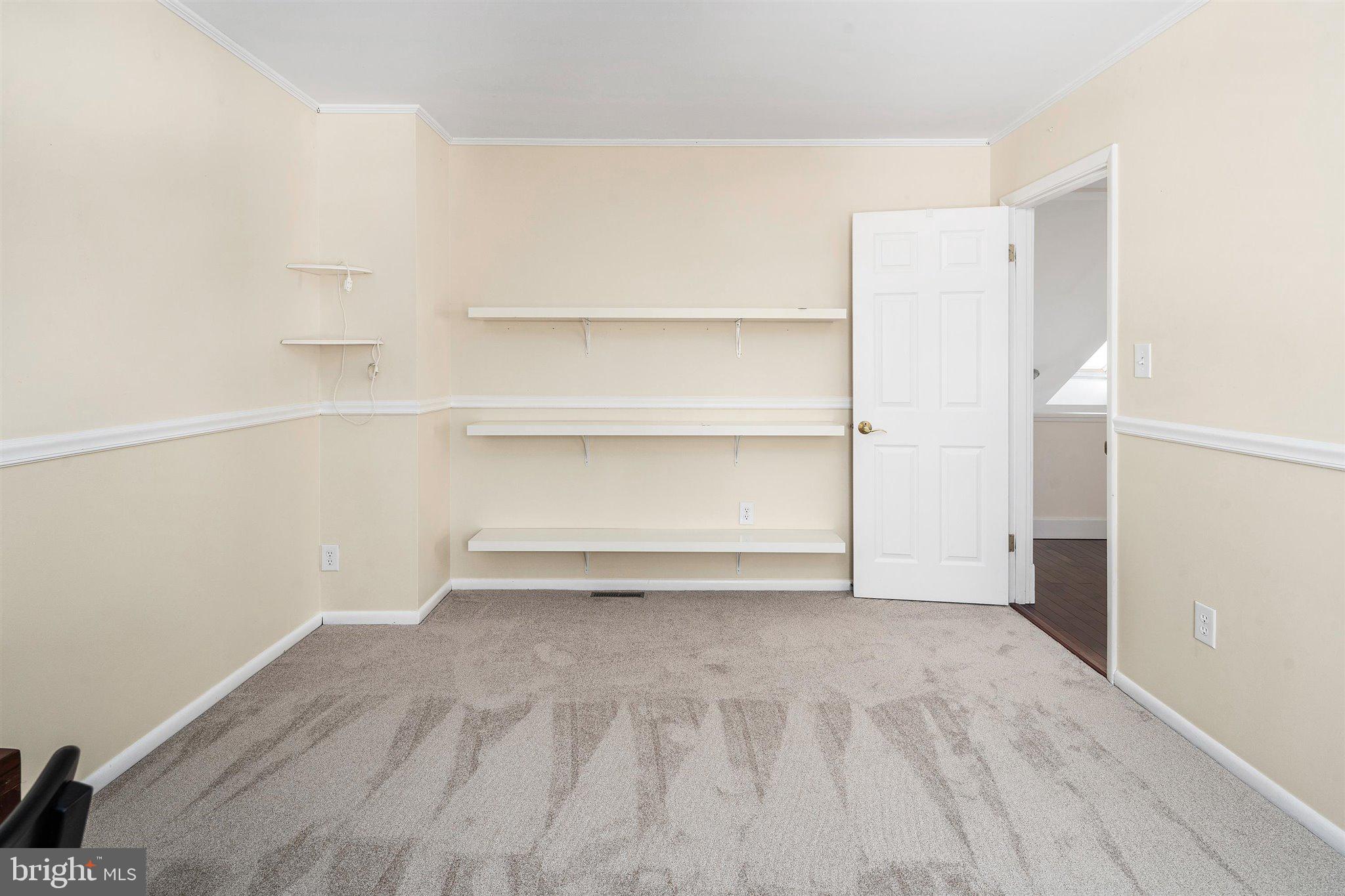6 Ginger Road Chesterfield, NJ 08515 - Photo 18 of 48 a view of an empty walk in closet with empty racks