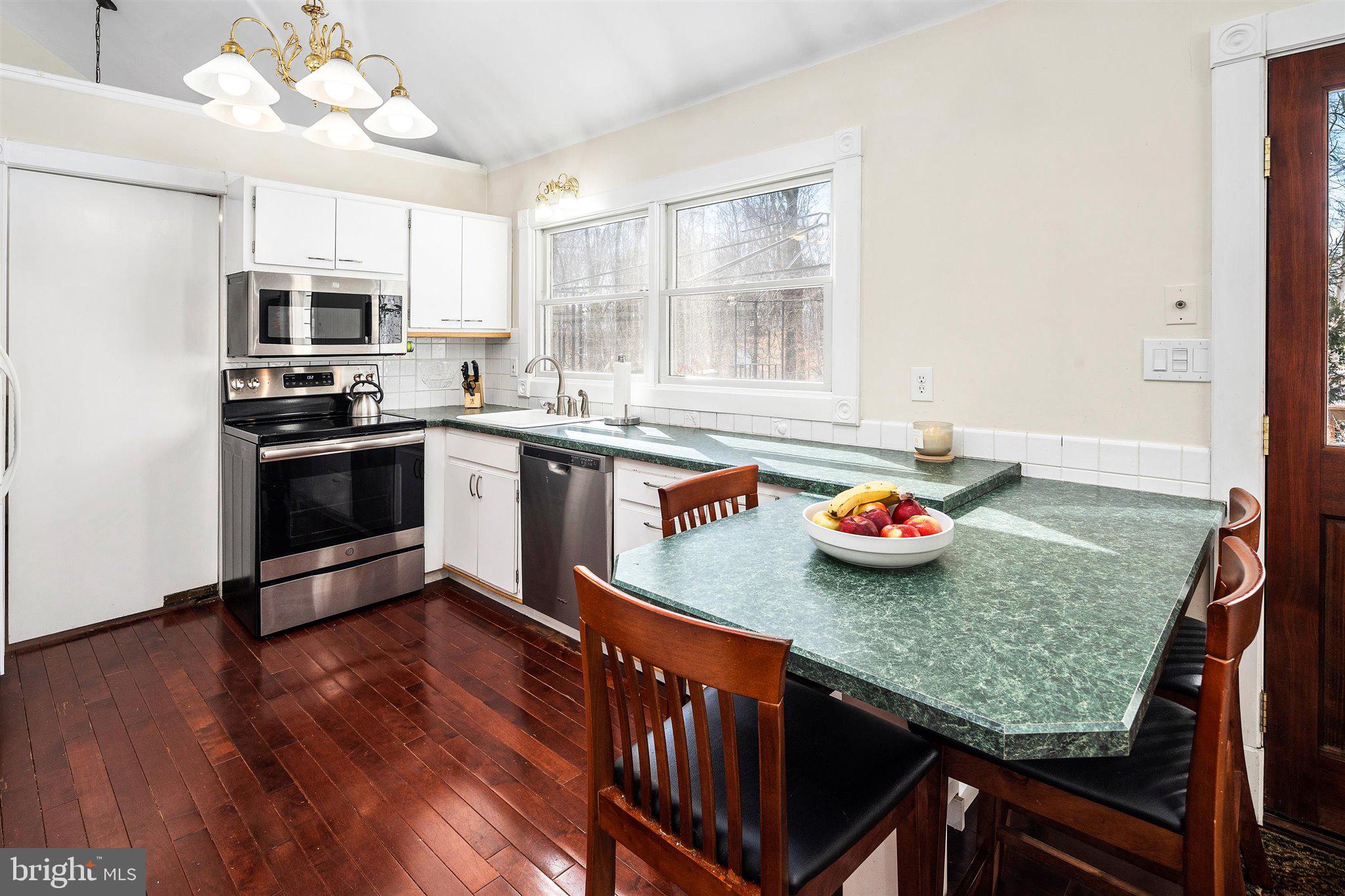 6 Ginger Road Chesterfield, NJ 08515 - Photo 29 of 48 a kitchen with stainless steel appliances granite countertop a sink and microwave