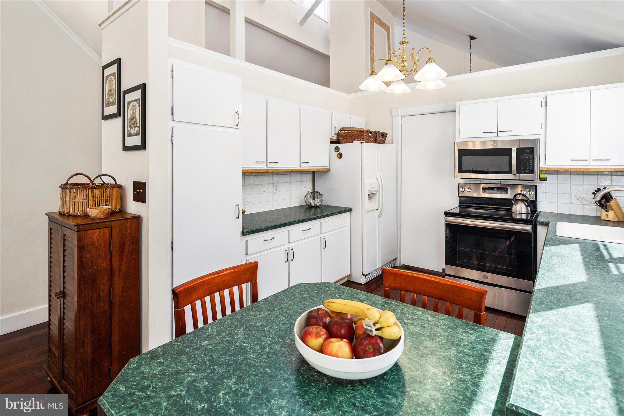 6 Ginger Road Chesterfield, NJ 08515 - Photo 30 of 48 a kitchen with stainless steel appliances granite countertop a sink stove and refrigerator