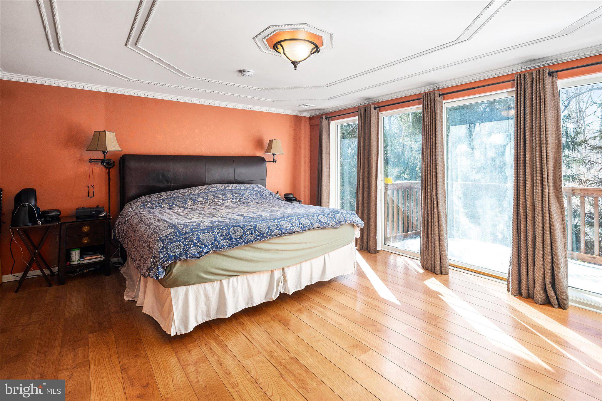 6 Ginger Road Chesterfield, NJ 08515 - Photo 31 of 48 a bedroom with a bed and wooden floor