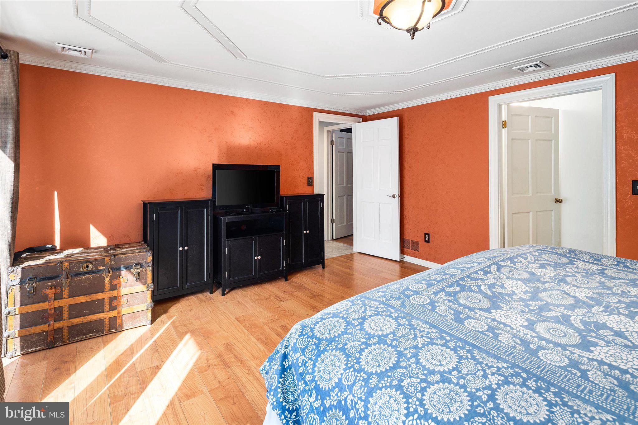 6 Ginger Road Chesterfield, NJ 08515 - Photo 32 of 48 a bed room with a bed and television