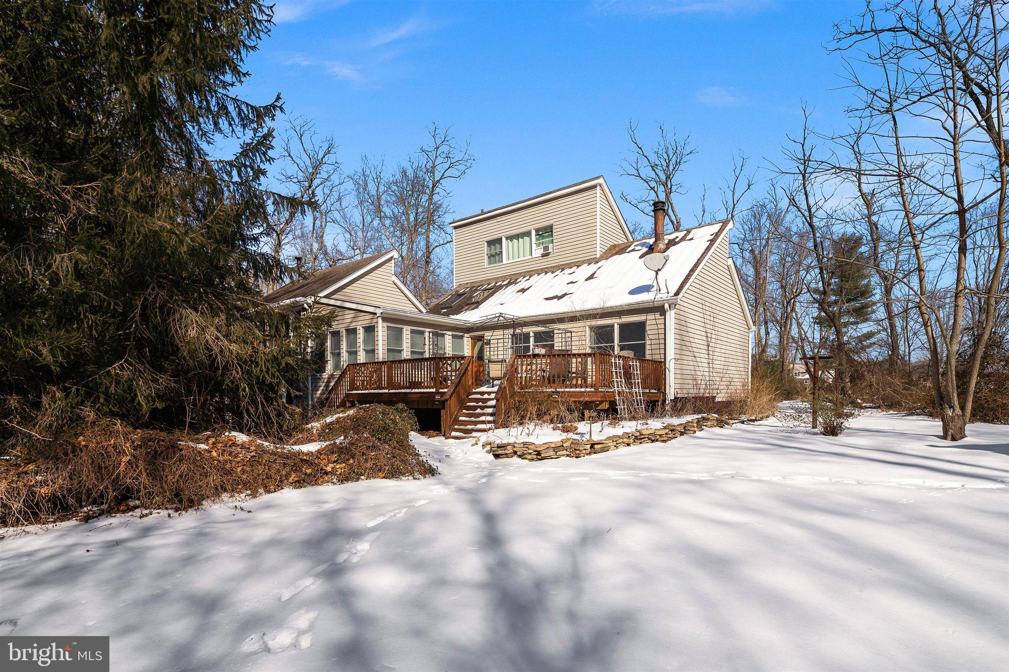 6 Ginger Road Chesterfield, NJ 08515 - Photo 45 of 48 a view of a house with large trees and sitting area