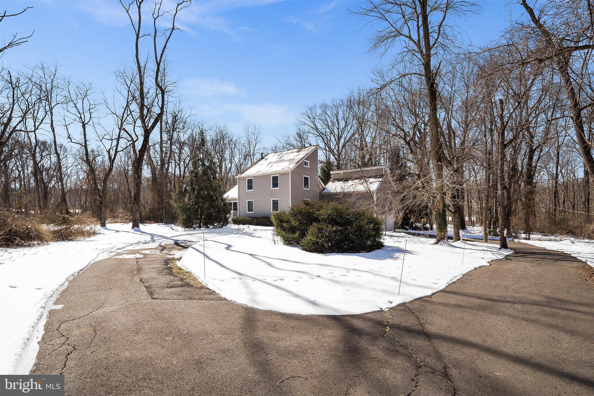 6 Ginger Road Chesterfield, NJ 08515 - Photo 7 of 48 a view of a white house with a snow on the road