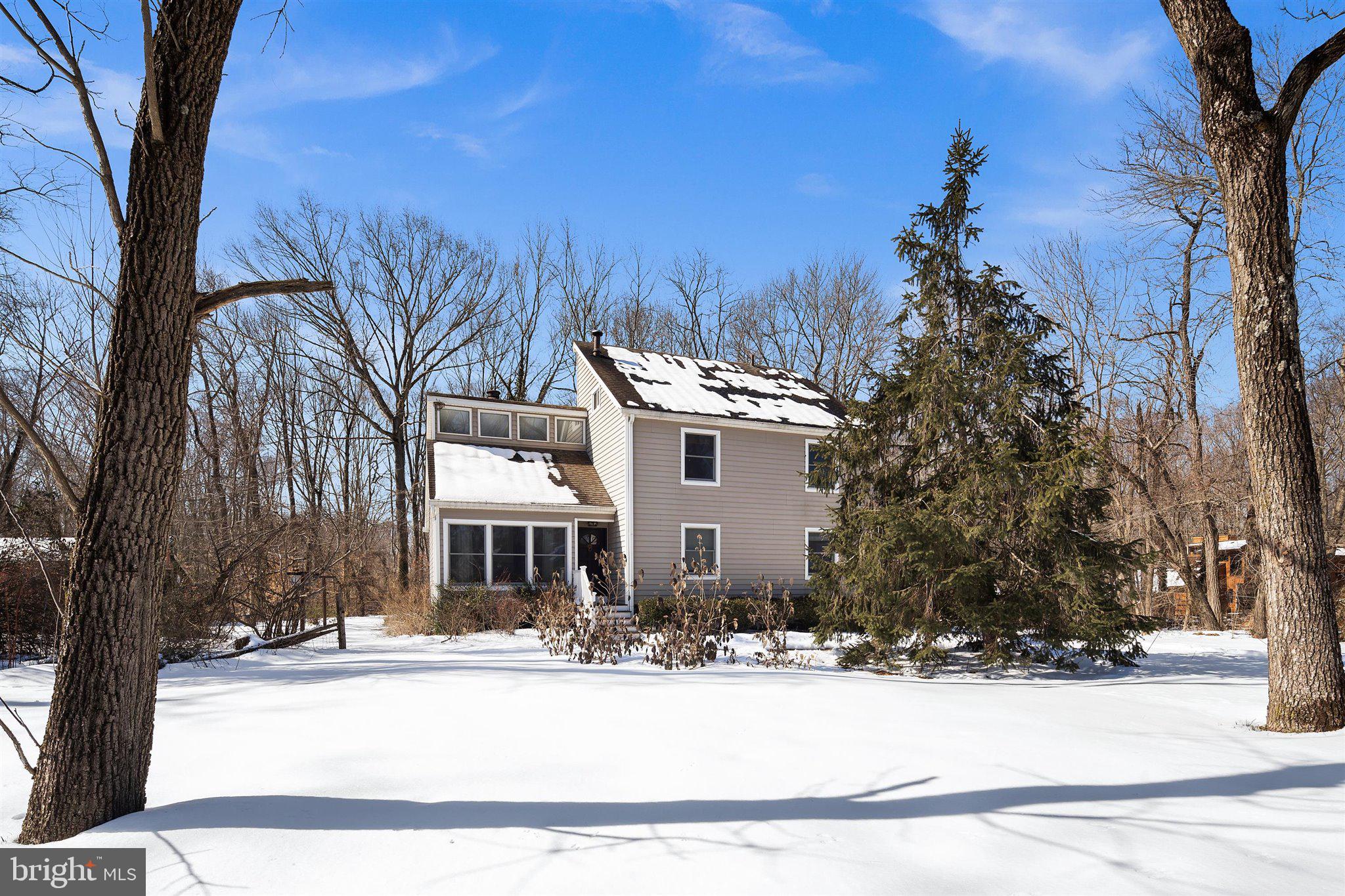 6 Ginger Road Chesterfield, NJ 08515 - Photo 9 of 48 a front view of a house with a yard and tree s
