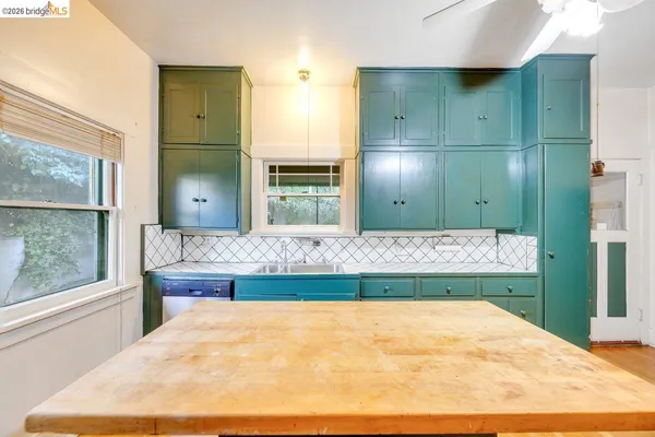 a bathroom with a tub and shower