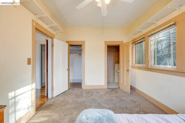 a view of hallway with windows