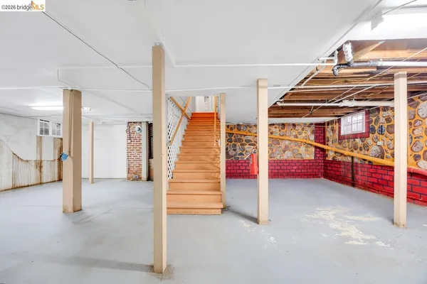 an empty room with white walls and white walls