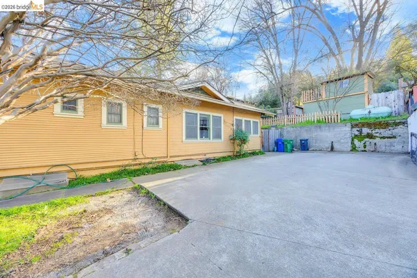 a house view with a backyard space
