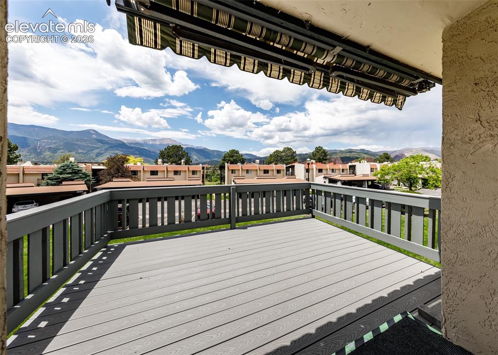 1034 Fontmore Road, Unit D Colorado Springs, CO 80904 - Photo 40 of 43 a balcony with wooden floor
