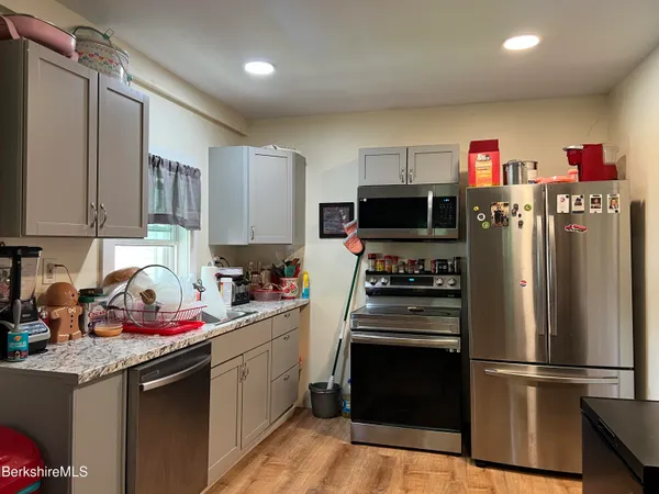 a room with furniture and a fireplace