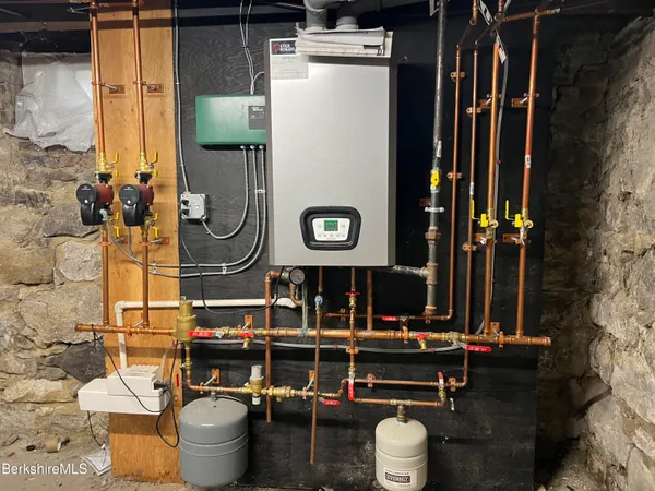 a view of porch with a table and chairs