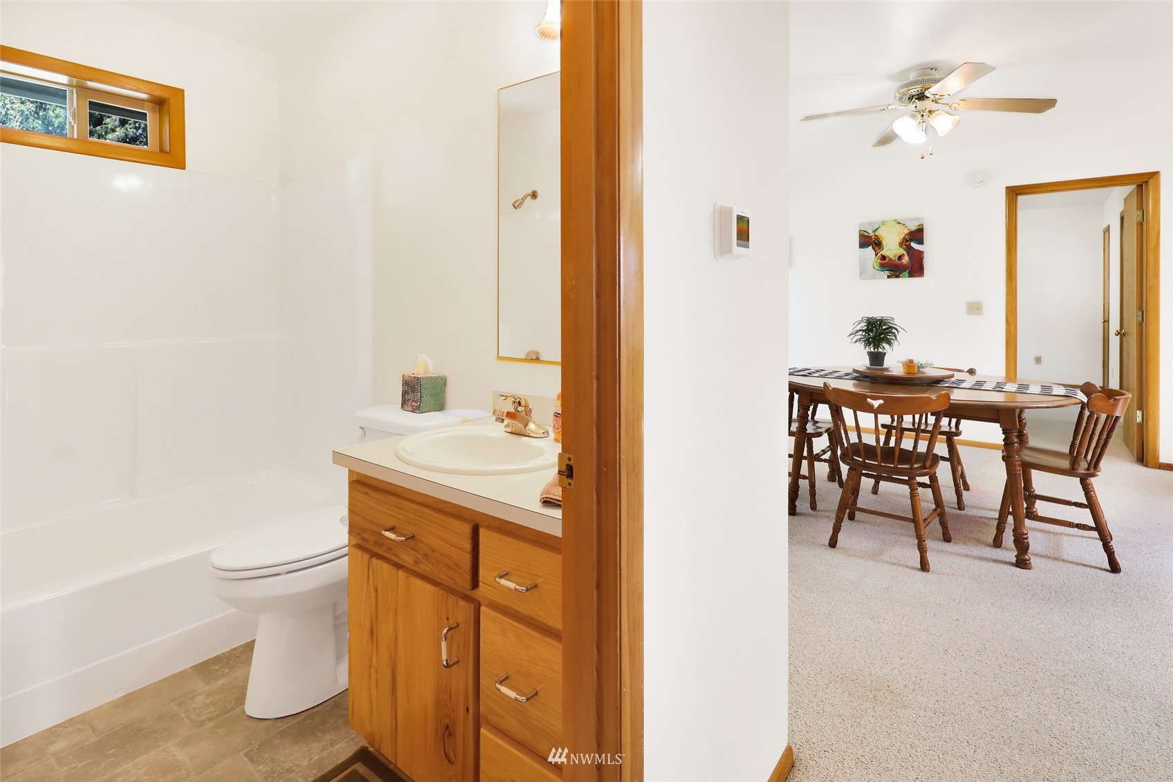3938 Bowen Road Sumas, WA 98295 - Photo 17 of 34 a bathroom with a sink a toilet and a mirror