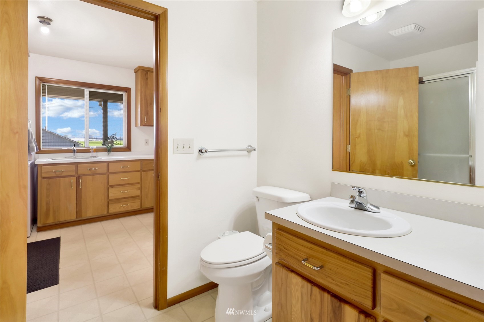 3938 Bowen Road Sumas, WA 98295 - Photo 22 of 34 a bathroom with a sink a toilet and shower