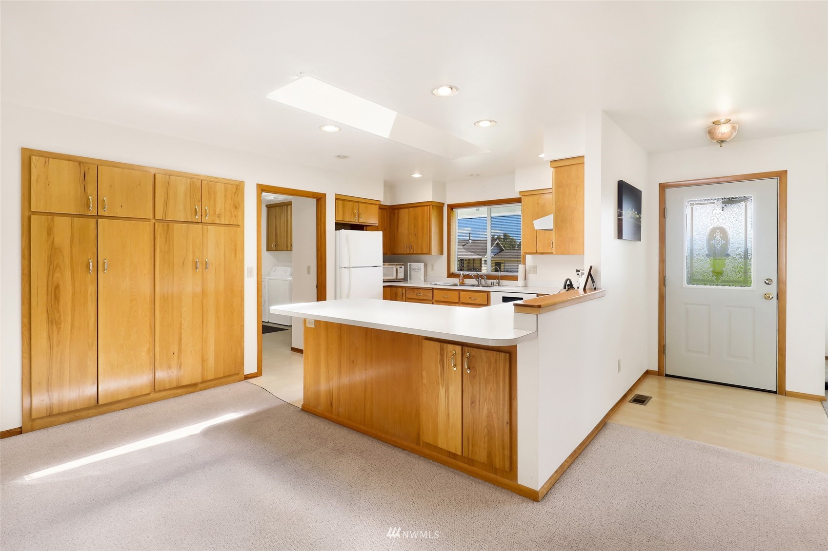 3938 Bowen Road Sumas, WA 98295 - Photo 5 of 34 a kitchen with stainless steel appliances granite countertop a refrigerator and a stove top oven