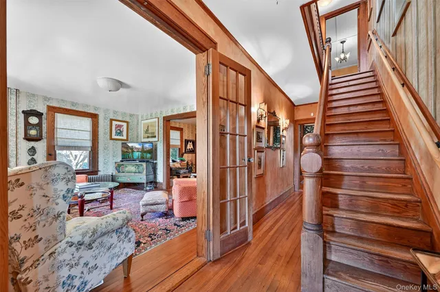 a view of a living room and entryway