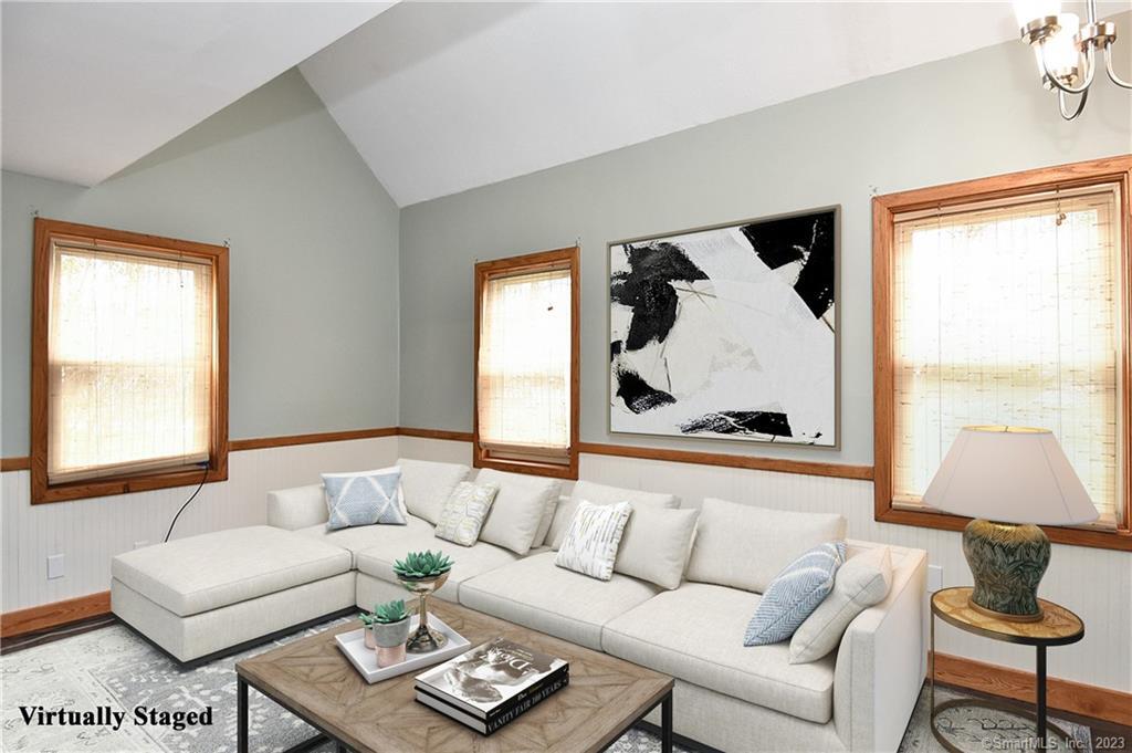 45 4 Mile River Road Old Lyme, CT 06371 - Photo 1 of 1 a living room with furniture and a window
