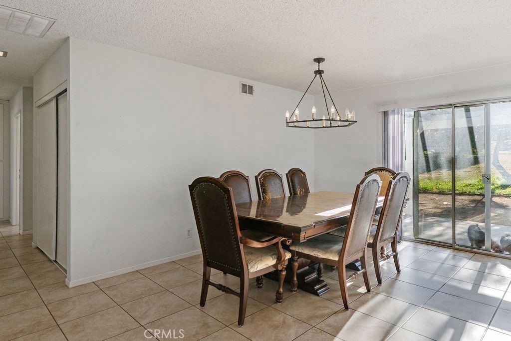 7365 Chase Hesperia, CA 92345 - Photo 4 of 21 a dining room with furniture and window