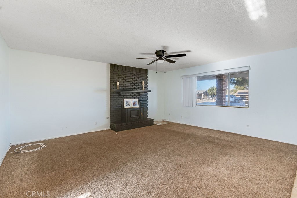 7365 Chase Hesperia, CA 92345 - Photo 5 of 21 a view of an empty room with a window