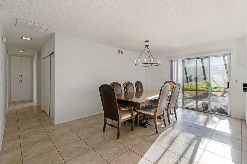7365 Chase Hesperia, CA 92345 - Photo 7 of 21 a view of a dining room with furniture window and outside view