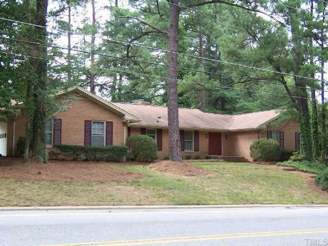 2501 10th Avenue Raleigh, NC 27612 - Photo 12 of 12 a front view of house with a garden