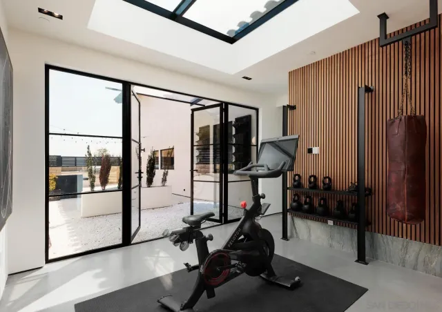 a view of a room with gym equipment