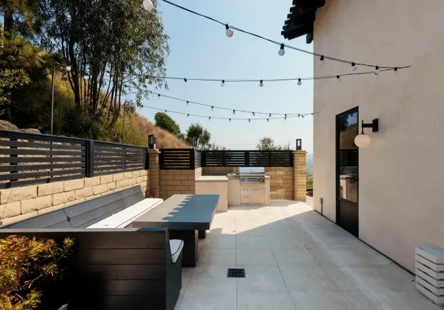 a view of a terrace with seating area