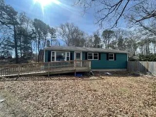 a house view with a garden space