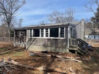 359 Great Western Road Harwich, MA 02645 - Photo 8 of 16 a front view of a house with a yard