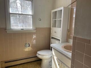 359 Great Western Road Harwich, MA 02645 - Photo 10 of 16 a white toilet sitting next to a bathroom sink