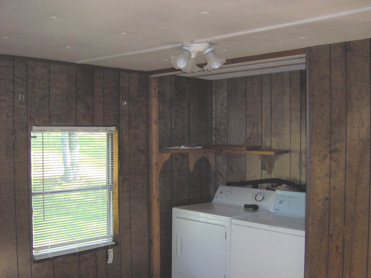 2209 Parrish Road Goodview, VA 24095 - Photo 6 of 9 a bathroom with a sink and a toilet