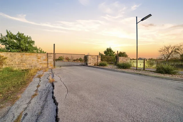 a view of a road with a lake view