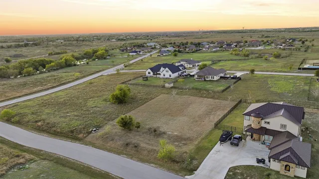 an aerial view of a house with outdoor space
