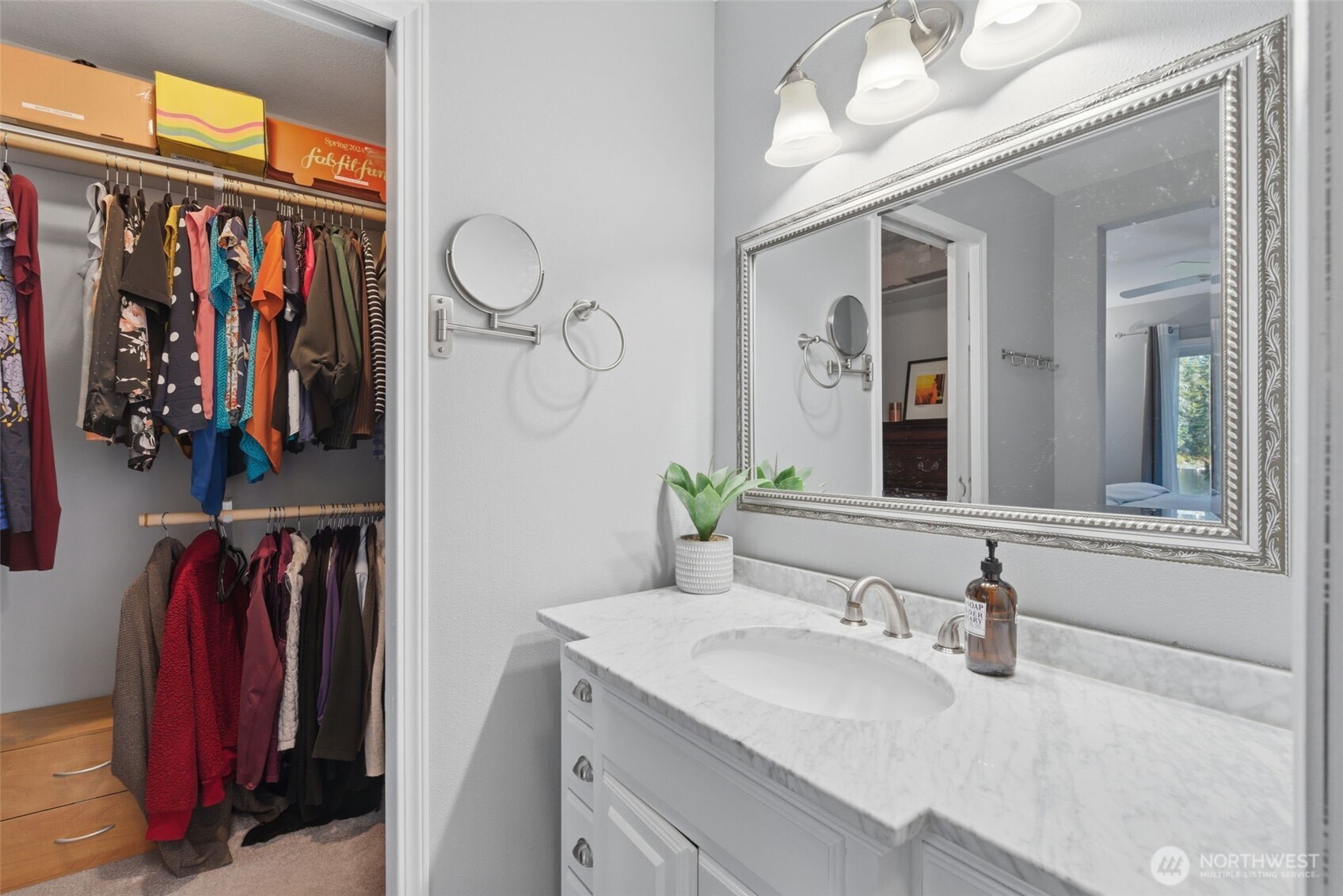 6971 Northeast Tahuya Blacksmith Road Belfair, WA 98528 - Photo 23 of 38 a bathroom with a sink and a mirror