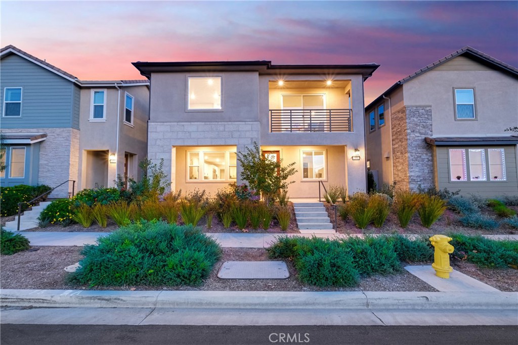 208 Chorus Irvine, CA 92618 - Photo 1 of 1 a front view of a house having yard