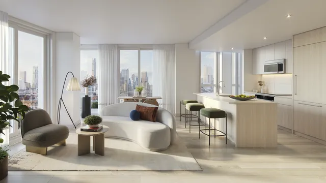 a living room with fireplace furniture and a large window