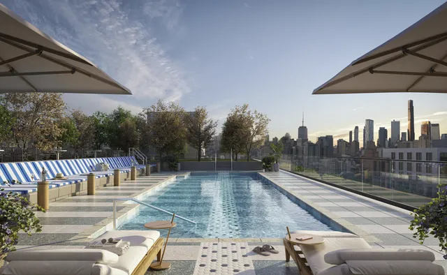 a view of a swimming pool with a patio