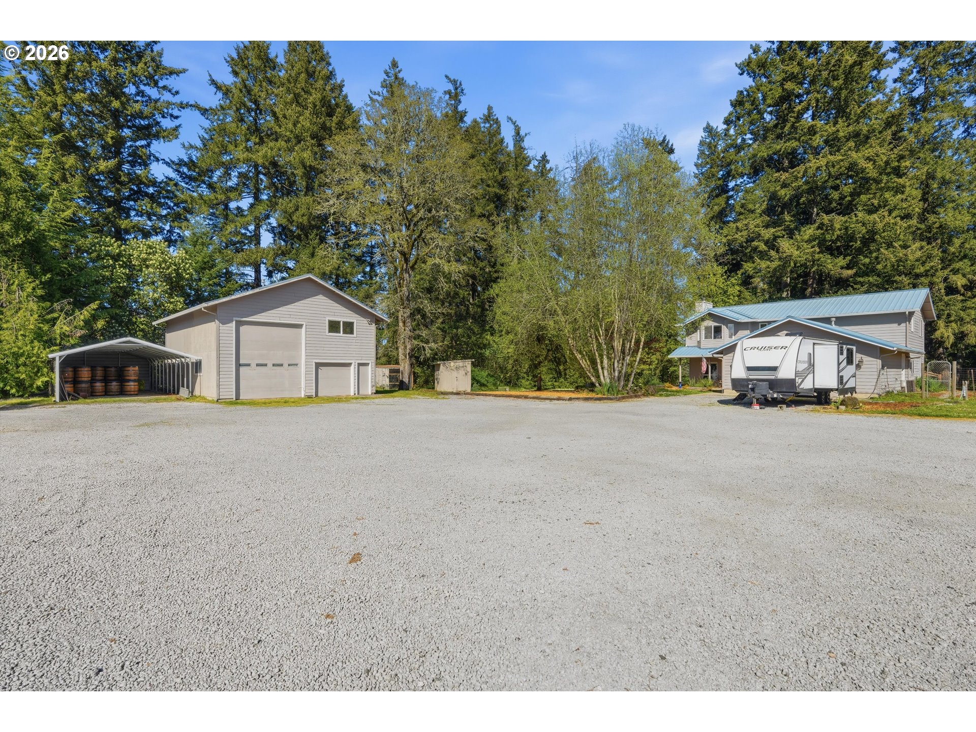 23032 Northeast Hagey Road Dundee, OR 97115 - Photo 2 of 42 a front view of a house with a yard and garage