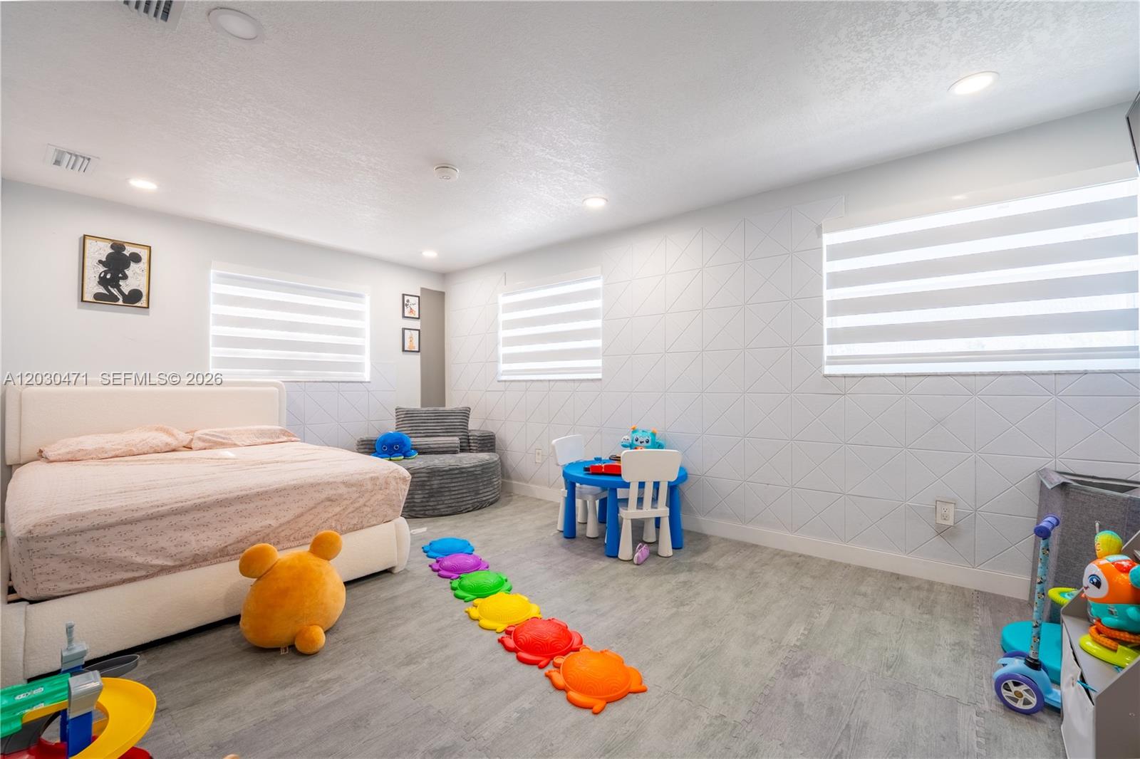 11851 Southwest 181st Street Miami, FL 33177 - Photo 7 of 25 a bedroom with furniture and a window