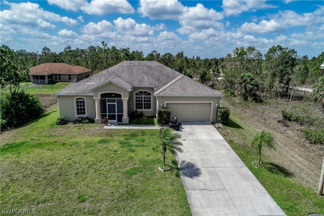 1060 Plantation Road Lehigh Acres, FL 33974 - Photo 1 of 24 Gallery Image 1