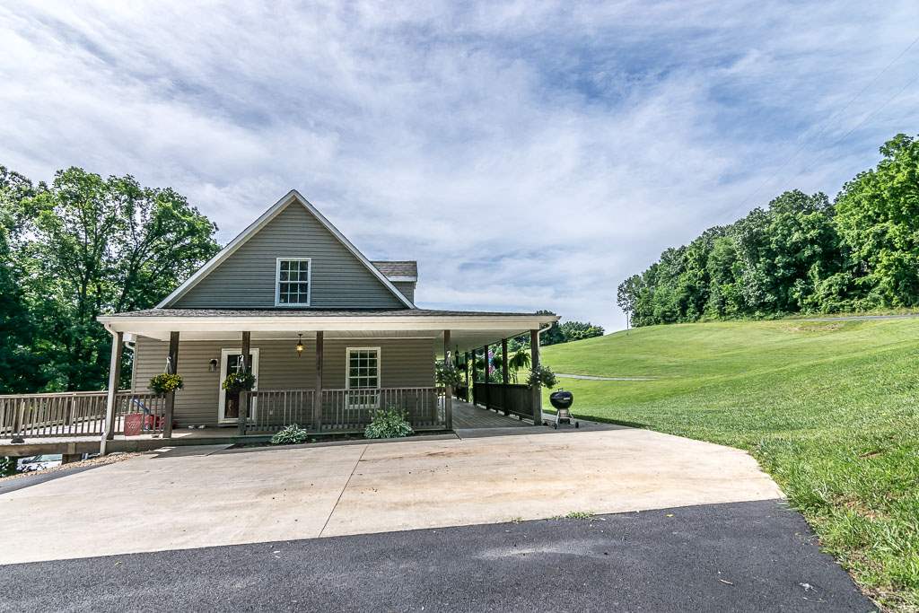 1283 Union Church Road Churchville, VA 24421 - Photo 10 of 50 a front view of a house with a yard and garage
