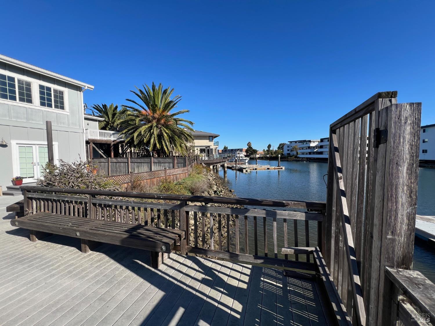 56 Mooring Road San Rafael, CA 94901 - Photo 43 of 45 The deck near the dock, looking back at the house. This deck and dock are shared by the 2 owners