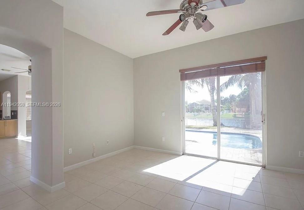 19416 Southwest 25th Court Miramar, FL 33029 - Photo 4 of 10 a view of an empty room with a window