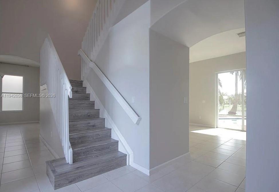 19416 Southwest 25th Court Miramar, FL 33029 - Photo 5 of 10 a view of entryway and hall with wooden floor