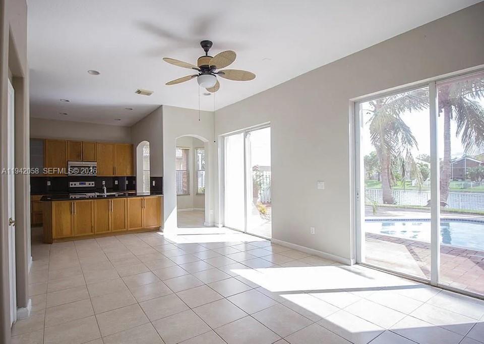 19416 Southwest 25th Court Miramar, FL 33029 - Photo 6 of 10 a view of a kitchen with a sink and a large window