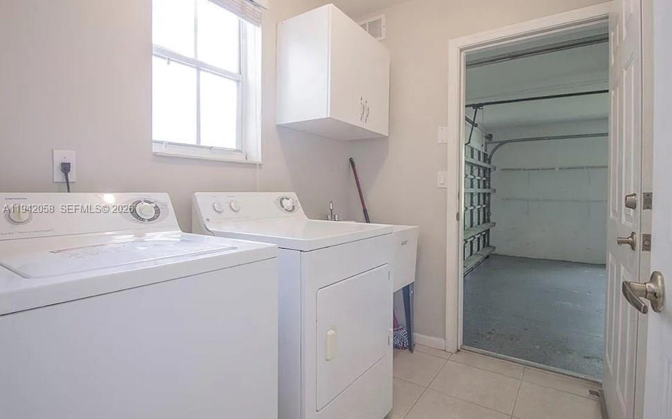 19416 Southwest 25th Court Miramar, FL 33029 - Photo 9 of 10 a utility room with dryer and washer